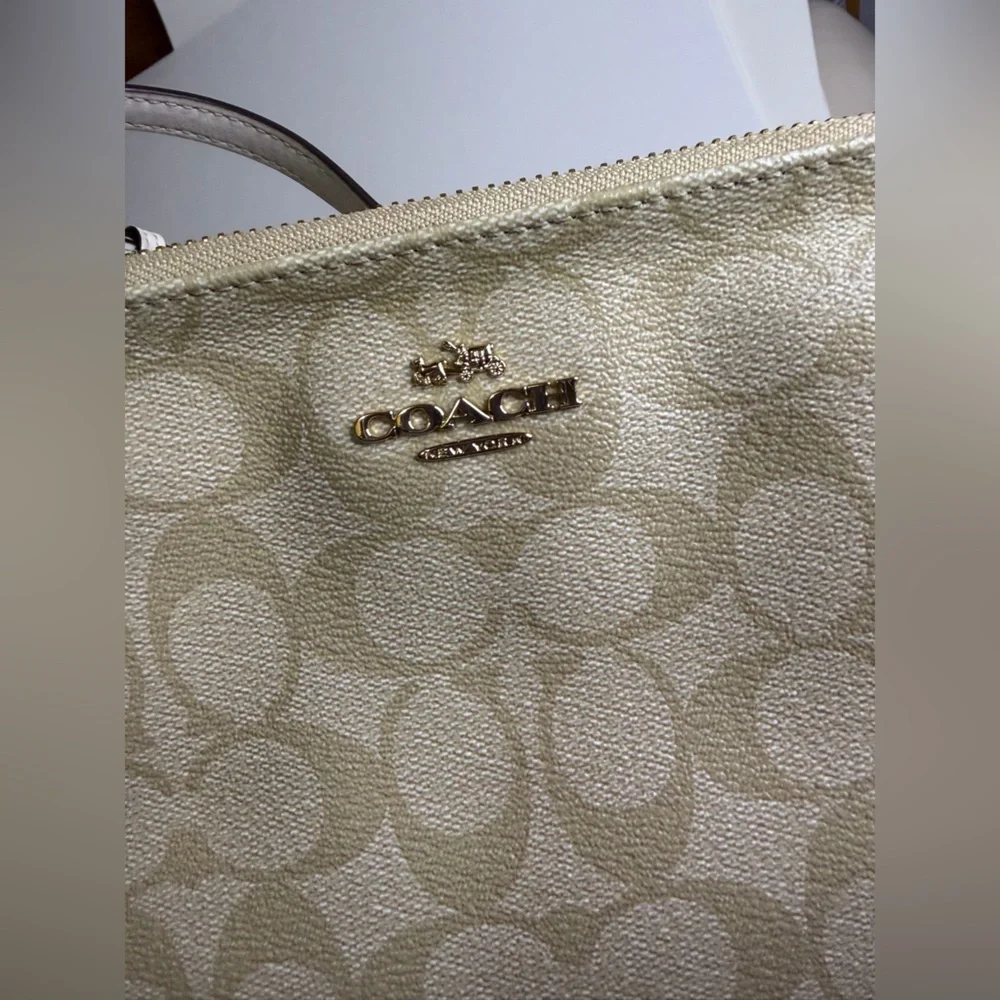 Coach Signature Tan‎ Beige Crossbody Bag with golden hardware